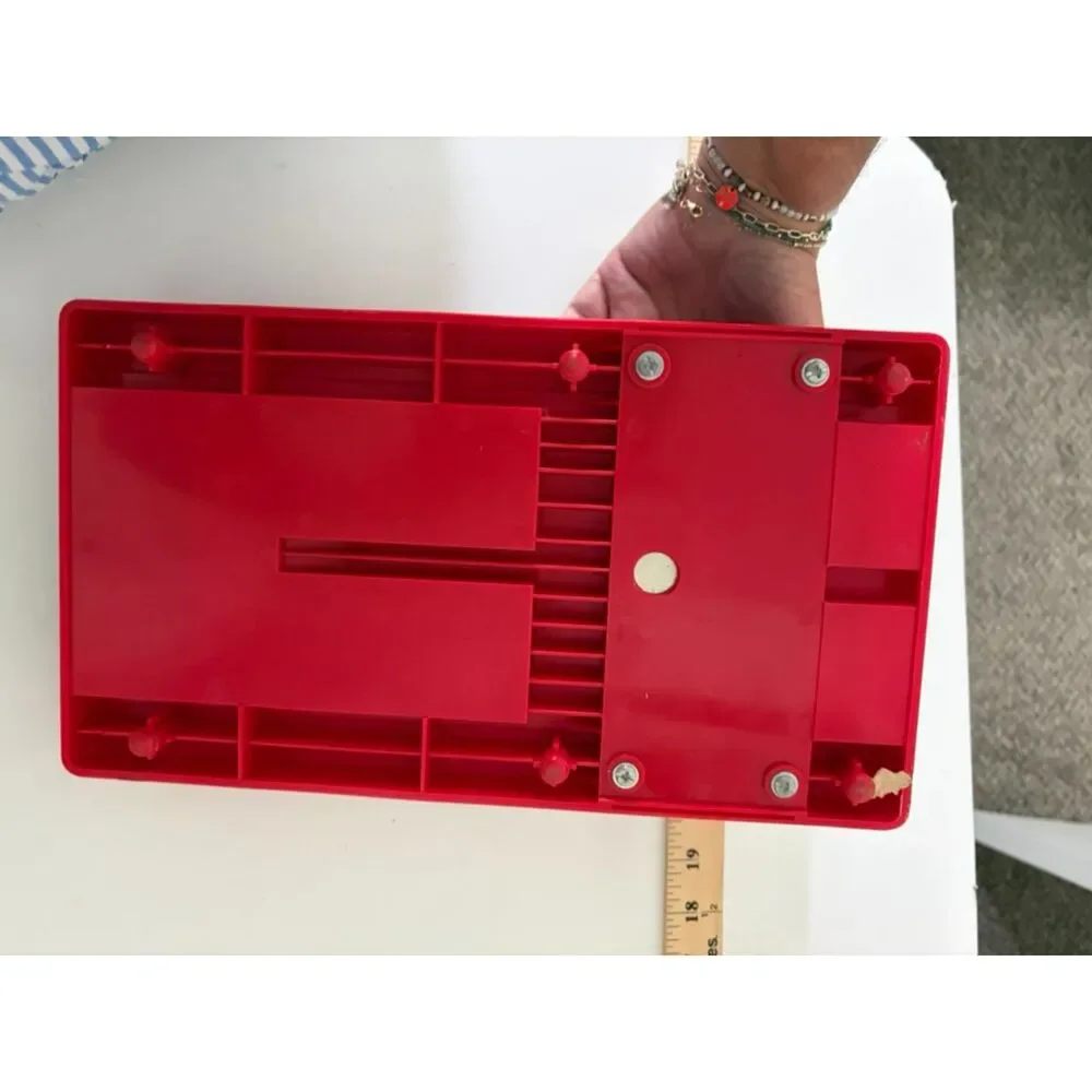 Red Sizzix original personal die cutter machine